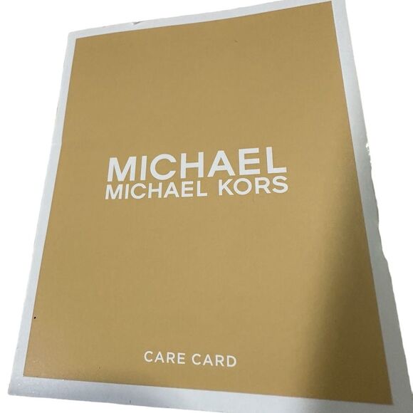 Michael Kors Mono-gram Canvas Jet Set
Backpack. Care tag included main image 7